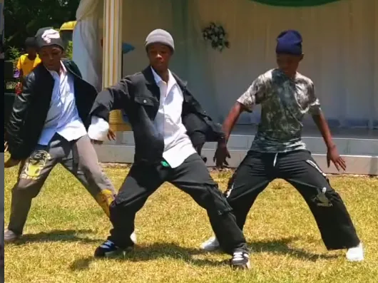 Group of children performing a dance routine