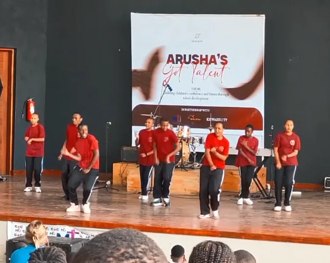 Young talent performing at an Arusha event