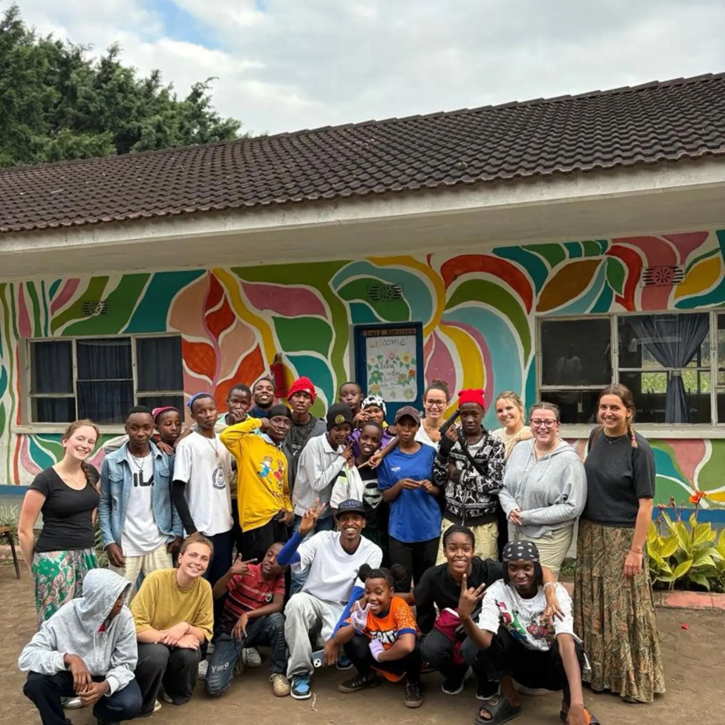Children and mentors sharing a joyful moment at Kipaji Spark