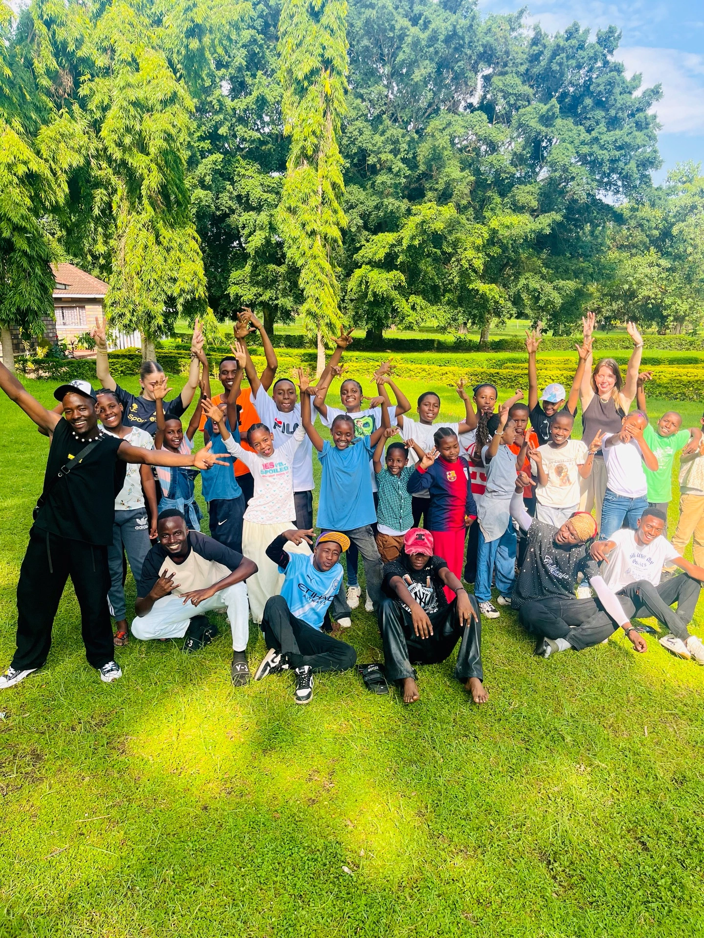Smiling children and youth enrolled in Kipaji Spark talent activities